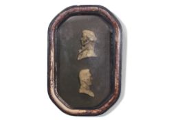 19th century framed and convex glazed wall hanging frame holding two waxed profile busts of Lord