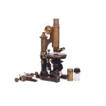 Leitz Wetzlar microscope, stamped 171157, in light oak case with some accessories etc, retailed by