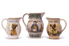 Group of three early 19th century Pratt ware pottery jugs, all decorated in relief with Admiral