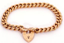 15ct stamped curb link bracelet with heart padlock and safety chain fitting, 19.4gms