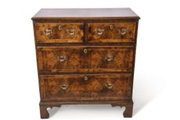 Late 18th century and later walnut crossbanded chest with two short over two long drawers, with