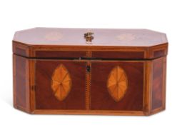 Sheraton style inlaid and mahogany tea caddy of canted rectangular form, the lid and front with