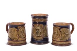 Group of three tankards, all produced by Royal Doulton circa 1905, all with typical Nelson