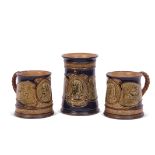 Group of three tankards, all produced by Royal Doulton circa 1905, all with typical Nelson