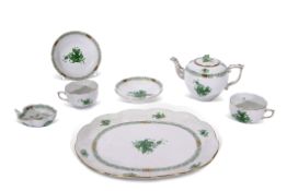 Herend part tea set decorated in green polychrome with floral sprays, comprising cup and saucer, tea
