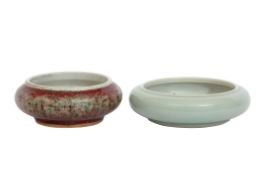 Two Chinese porcelain brush washer pots, one with green celadon type glaze and Qianlong mark to