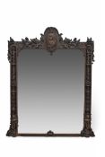 18th Century Dutch Carved and painted large overmantel mirror, crested with a central mount