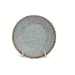Small Chinese Southern Song Dynasty dish decorated to the interior with fish amongst seaweed or