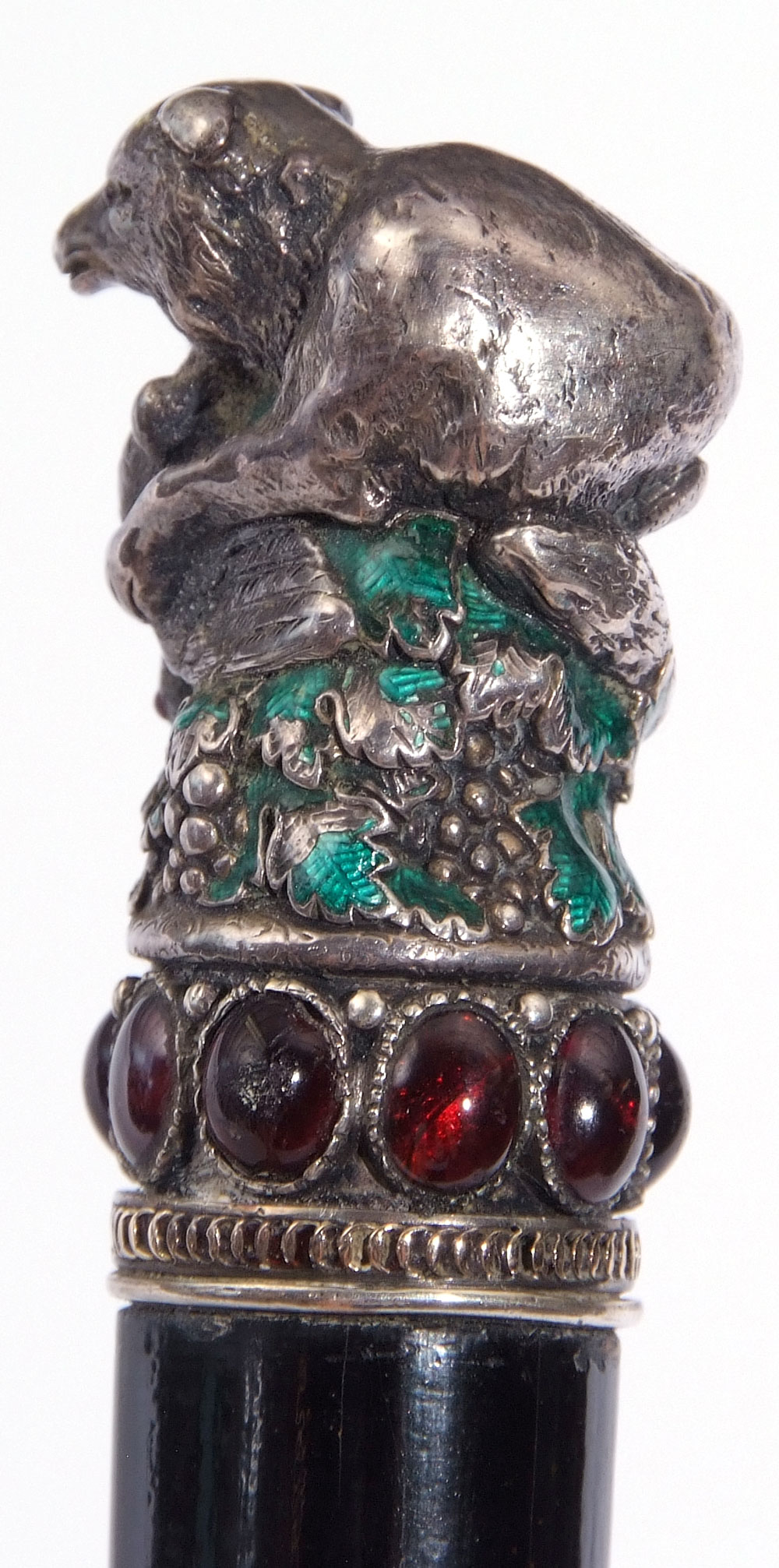 Ebonised cane, the white metal handle decorated in the form of a bear with prey with traces of green - Image 6 of 8