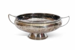 Arts & Crafts silver bowl, circular in form, raised on a pedestal base, with a hand hammered finish,