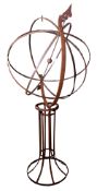 Large wrought iron armillary/weathervane, the globe shaped swivelling top with central arrow pointer