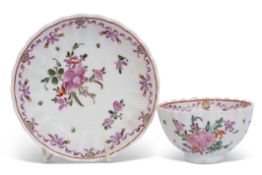 Lowestoft tea bowl and saucer circa 1780, the ribbed body with a floral design, saucer 12cm diam