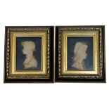 Leslie Ray (20th Century), a pair of wax relief silhouettes of an 18th Century Naval officer and his