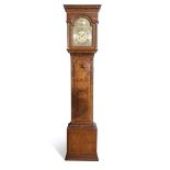 Walnut longcase clock, R Bradberry of Reeth, ogee moulded hood over an arched dial, silvered name