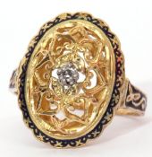 Diamond and enamel filigree ring, the oval pierced dome centring a small diamond, the border and