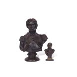 Pair of busts of Vice Admiral Nelson, one raised on a circular foot, the other smaller bust on an