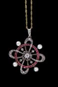 Ruby, diamond and pearl pendant centring an old cut diamond, raised in a flowerhead design within an