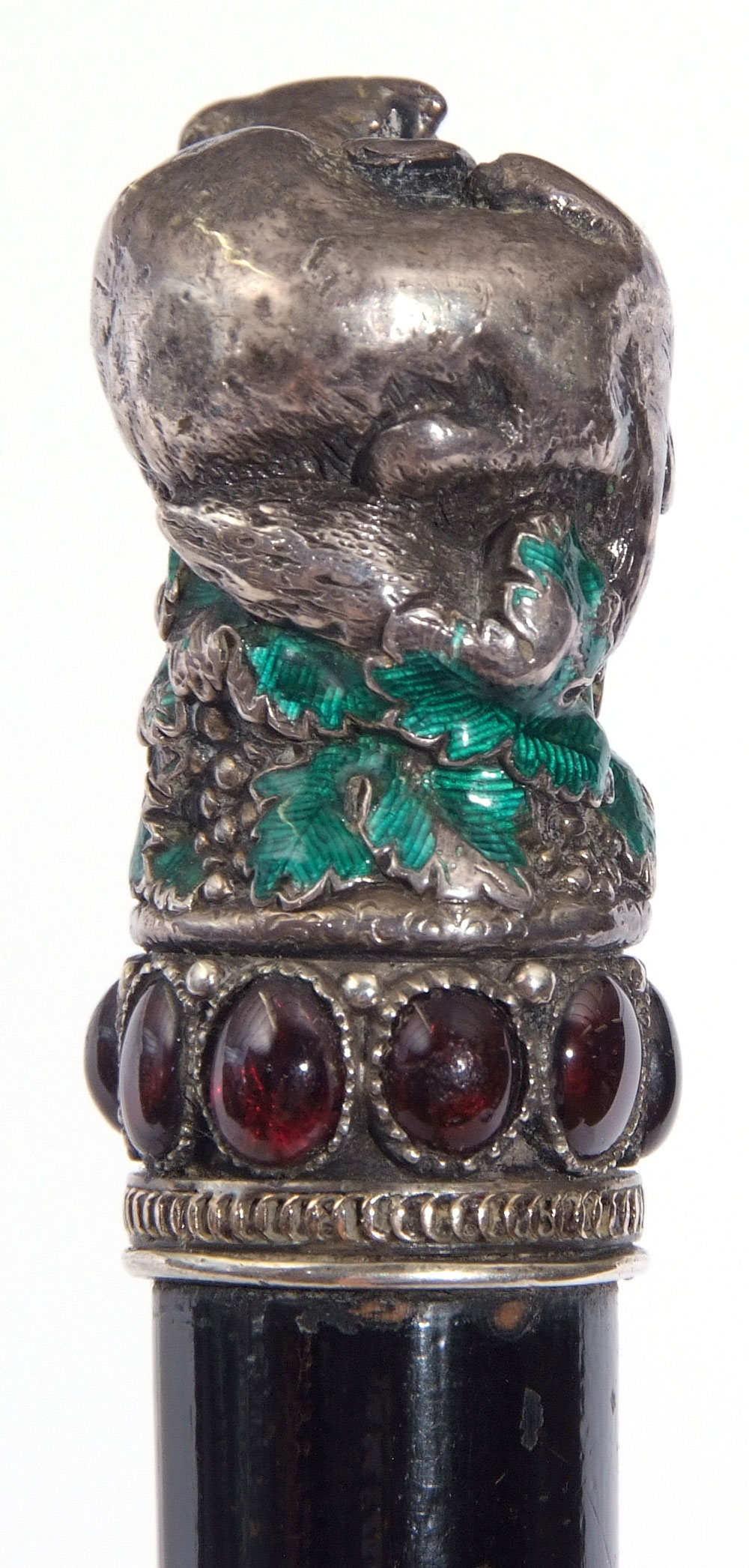 Ebonised cane, the white metal handle decorated in the form of a bear with prey with traces of green - Image 7 of 8