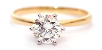 Single stone diamond ring, the round brilliant cut diamond weighing 1.55cts, the stone set ni an