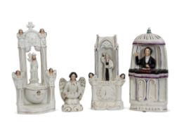 Group of Staffordshire figures of religious interest including Spurgeon and Wesley, and two
