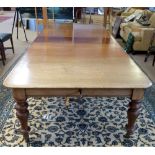 Victorian mahogany wind-out extending dining table and matching leaf storage stand, moulded edge and