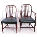 Set of ten mahogany dining chairs with arched backs and pierced splats with carved detail, green