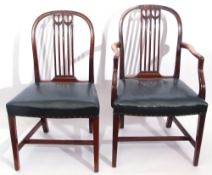 Set of ten mahogany dining chairs with arched backs and pierced splats with carved detail, green