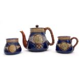 Early 20th century Royal Doulton tea set comprising tea pot, sugar bowl and milk jug, all