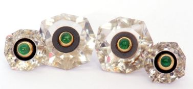 Pair of octagonal faceted crystal cuff links centring four cabochon emeralds mounted and connected