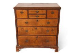 18th century and later oak and walnut chest, two central shallow drawers flanked on either side by a