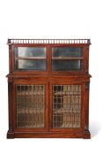 19th century mahogany bookcase cabinet, the top with galleried surround over two glazed doors