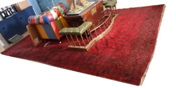 Late 20th century large Shiraz carpet (ex-Liberty & Co), multi-gull border, central panel of