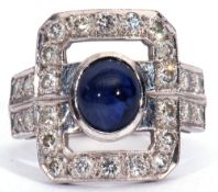 Sapphire and diamond dress ring, the carved open work rectangular panel centring an oval sapphire