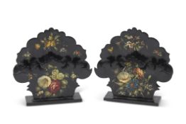 Pair of black lacquered floral decorated letter racks of shaped form, stamped "Jennens &