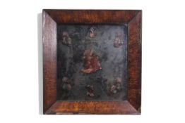 Monogrammed framed and glazed collection of waxwork profiles of 19th century historical figures