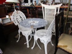 VINTAGE METAL GARDEN TABLE AND TWO MATCHING CHAIRS, THE TABLE APPROX 66CM DIAM