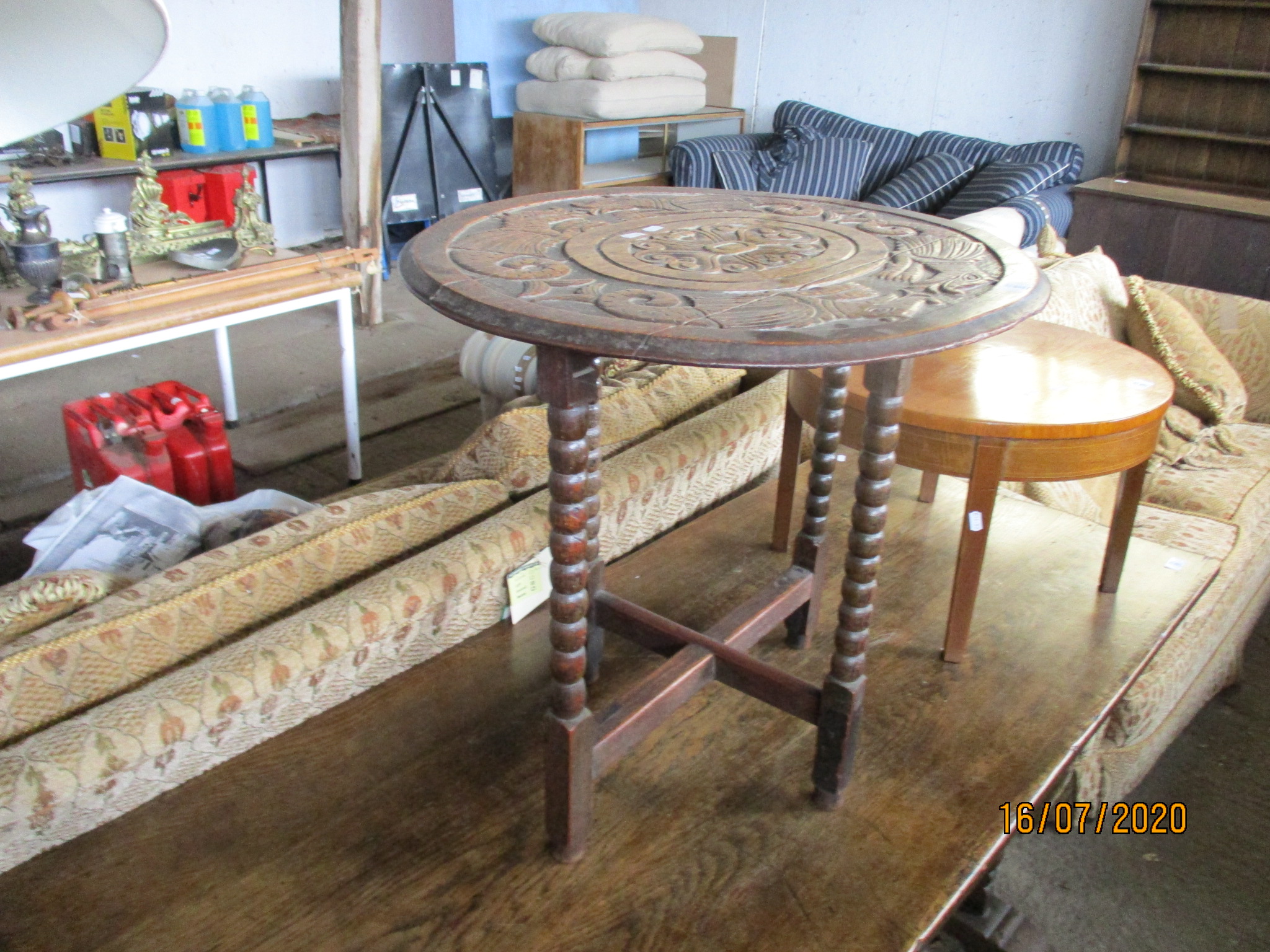 SMALL 19TH CENTURY OVAL TABLE, RAISED ON BOBBIN LEGS, HEAVILY CARVED TO TOP WITH DEPICTIONS OF - Image 2 of 3