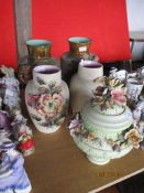 FIVE VARIOUS CAPO DI MONTE STYLE VASES WITH APPLIED FLORAL DECORATION, TALLEST APPROX 35CM