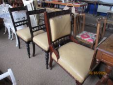 LEATHER UPHOLSTERED HALL CHAIR, HEAVILY CARVED TOGETHER WITH TWO SIMILAR SMALLER EXAMPLES, LARGEST