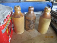 THREE SALT GLAZED STONEWARE BOTTLES INCLUDING STEWARD & PATTESON, NORWICH AND SWAFFHAM AND TWO