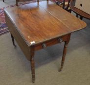 Early 19th century mahogany Pembroke table, two drop flaps fitted either end with drawer and dummy
