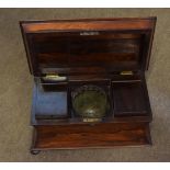 19th century rosewood tea caddy, of sarcophagus form, interior fitted with two compartments with