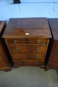 Reproduction mahogany chest of moulded edge over four graduated full width drawers on bracket