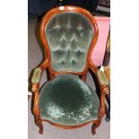 Victorian mahogany stained gents chair with green button back upholstery