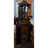Edwardian inlaid rosewood corner display cabinet, mirror back over a plush lined compartment, the