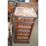 European walnut marble topped side cabinet of narrow proportions fitted with six drawers, 43cm wide