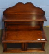 Mahogany table top cabinet, arched pediment and shelf over a glazed compartments, 62cm wide