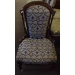 Victorian mahogany nursing chair with arched moulded cresting rail, pattern back and seat