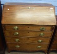 Early 19th century mahogany bureau, fall front, fitted interior and four drawers below on bracket