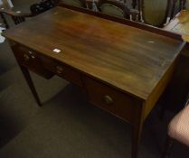 Edwardian mahogany small sideboard with short pediment over three drawers on tapering square